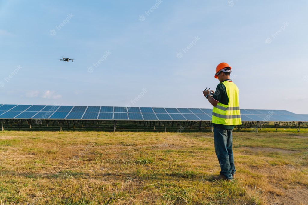 engineer-inspect-checking-solar-panel-by-drone-solar-power-plant